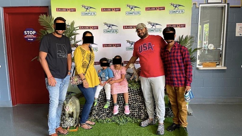 Venkatesh Sattaru, second to right, standing next to the alleged 20-year-old victim in the case (wearing the red and blue button down) and four other individuals.