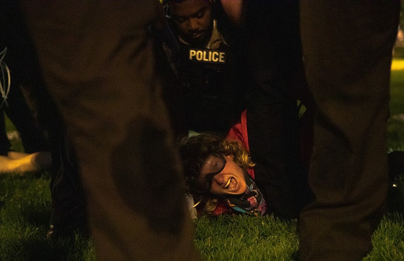 A protestor is arrested by police on Saturday, April 27, 2024, at Washington University. - ZACHARY LINHARES