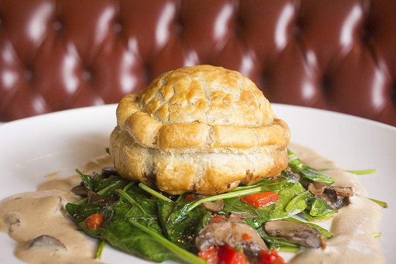 Beef Wellington with sauteed medley of spinach, mushrooms, roasted red peppers, duxelles and wild mushroom demi-glace. - PHOTO BY MABEL SUEN