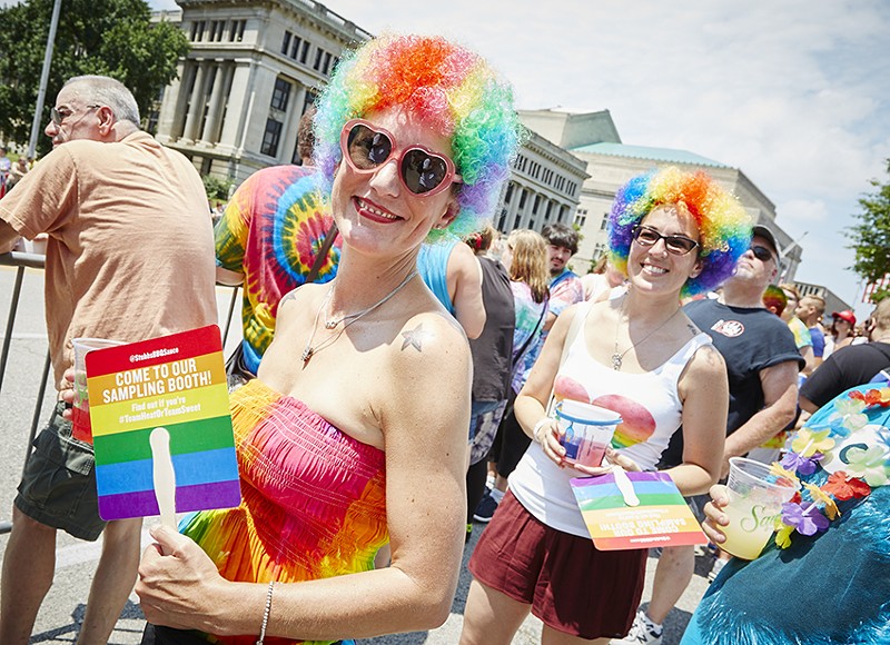 Attendees enjoy Pride St. Louis' 2016 event. The parade will remain free, but in 2017, entry to the festival will be $5 per day. - PHOTO BY STEVE TRUESDELL