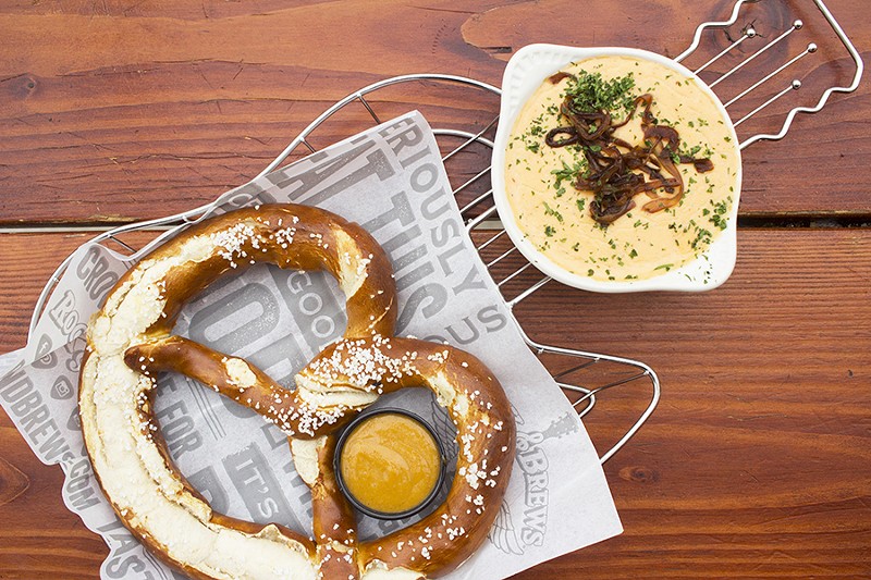 The Bavarian pretzel comes with an optional beer-cheese sauce. - PHOTO BY MABEL SUEN