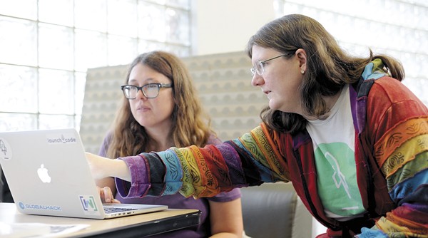 "It's a joy to see them light up with ideas, questions and confidence," engineer Jenny Brown says of the women she mentors through CoderGirl. - PHOTO BY KELLY GLUECK