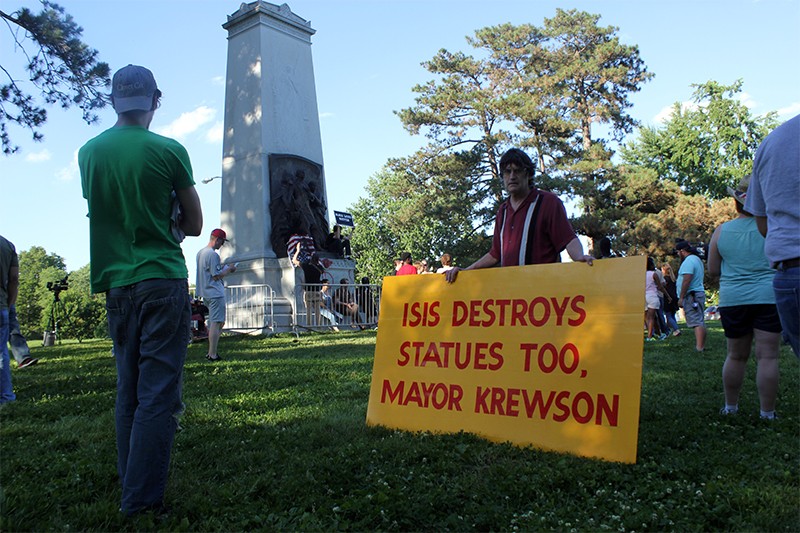 Bill Hannegan, a vocal defender of the Confederate monument, showed up to Tuesday's demonstration with a sign addressing St. Louis Mayor Lyda Krewson. - Photo by Danny Wicentowski