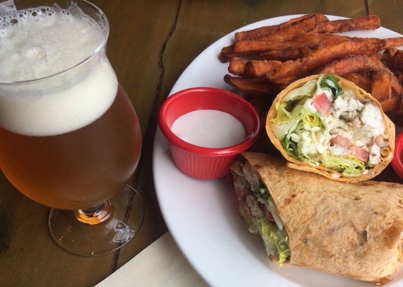 Third Wheel Brewing's chicken wrap with sweet potato fries. - PHOTO BY EMILY MCCARTER