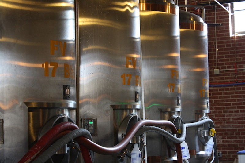 The brewery uses a seven-barrel system to craft its beer. - PHOTO BY BILL LOELLKE