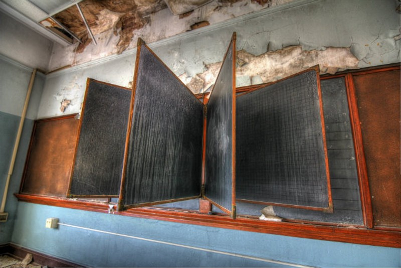 "The Boardroom," was taken at Simmons school, which was built in 1899 and closed in 2009. It is part of the new photo exhibit, "Empty Halls, Silent Classrooms," which will open in Brentwood August 11. - PHOTO BY V. ELLY SMITH