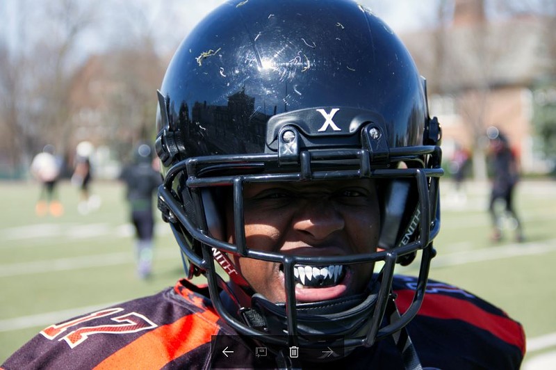 Slam linebacker Raven Williams shows off her game face during a scrimmage in March. - PHOTO BY DANNY WICENTOWSKI