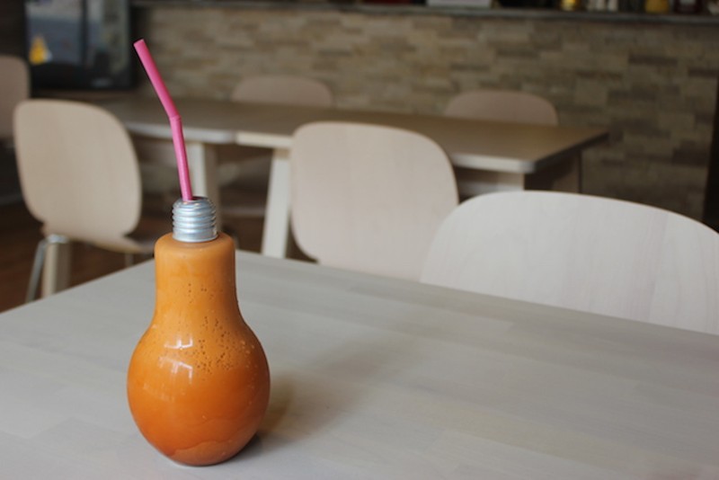 Thai tea is served in a container shaped like an lightbulb. - PHOTO BY SARAH FENSKE