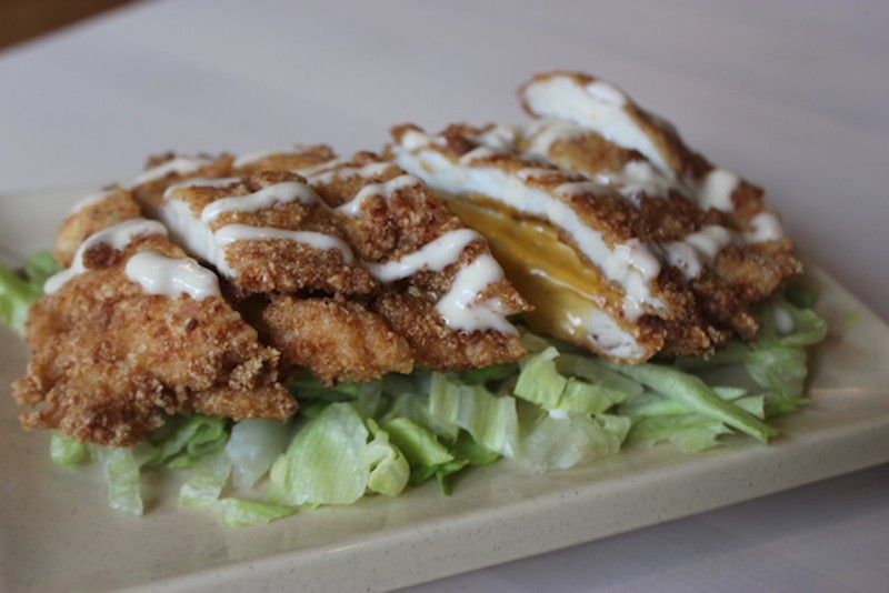 "Volcano Chicken," one of the most popular appetizers, is fried chicken stuffed with American cheese. - PHOTO BY SARAH FENSKE