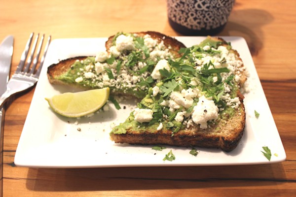 Half & Half's take on avocado toast features cilantro and feta cheese. - PHOTO BY LAUREN MILFORD