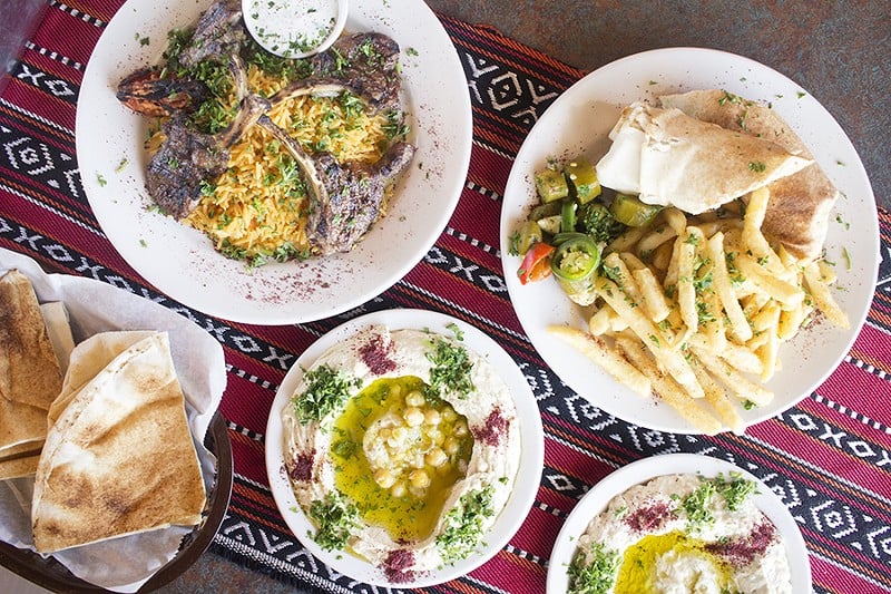 A selection of dishes from Albadia: lamb chops, chicken shawarma sandwich, hummus and baba ganoush. - PHOTO BY MABEL SUEN
