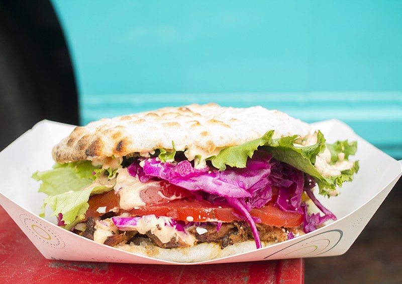 Döner comes with thinly sliced rotisserie chicken, served with somun,  a wood-fired bread similar to pita. - MABEL SUEN