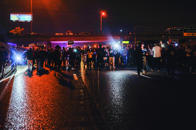 Protesters block I-64/40 in St. Louis on Tuesday, October 3. - PHOTO BY KELLY GLUECK