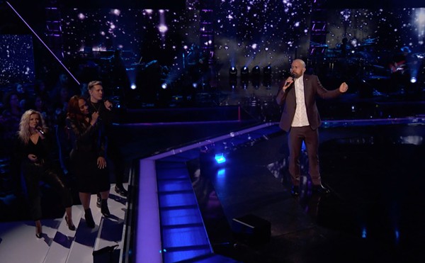 St. Louis musician Neil Salsich performs on stage at The Voice.