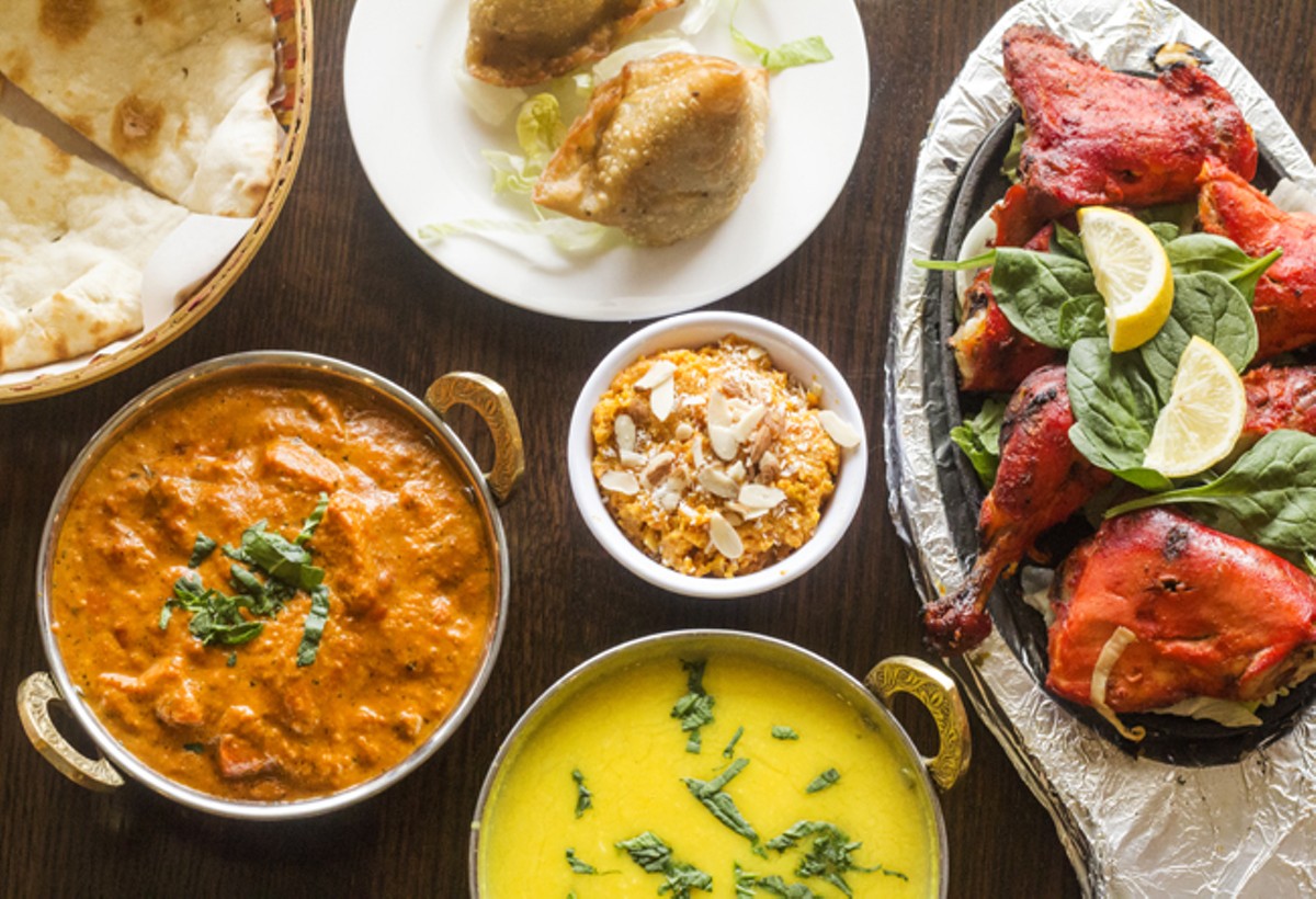 Dishes at Aroma Grill include samosas, butter chicken, gazar halwa, tadka daal and tandoori chicken.