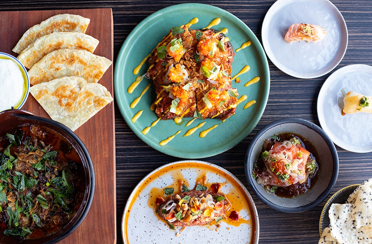 A selection of items from Indo, pictured from top to bottom, left to right: short rib curry, shrimp toast, benitoro, shima aji, laarb and salmon sashimi.