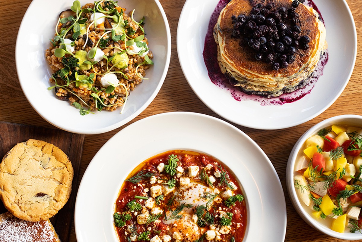 A selection of items from Winslow's Table, pictured from left to right, top to bottom: grain salad, Winslow's pancakes, baked goods, shakshuka and chicken and dumplings.