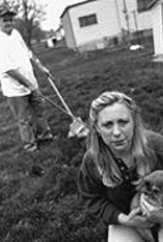 Yucko's head honcho Debbie Levy (foreground) with her dog Sasha and Harry the Executive Pooper-Scooper.