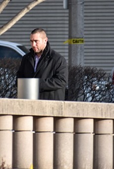 Ex-St. Louis cop Dustin Boone walks into federal court in 2018.