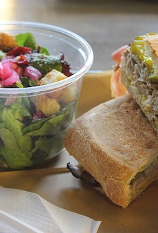 The "Cubano" sandwich with a side salad is among seven sandwich offerings on the current menu.
