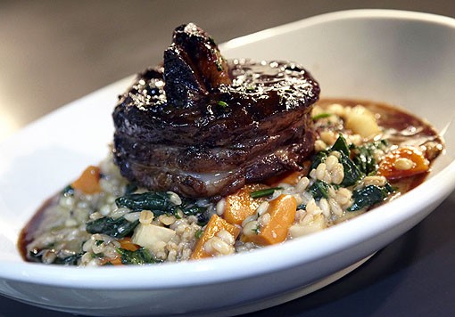 Molly's Beef Burgundy over barley risotto and roasted root veggie. See more photos from Molly's in our slideshow. - PHOTO: STEVE TRUESDELL