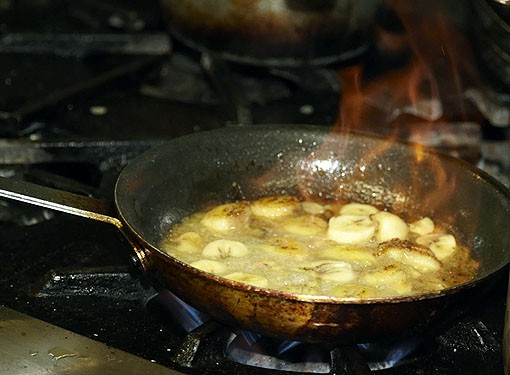 Cooking the bananas for the Foster Beignets. See more photos from Molly's in our slideshow. - PHOTO: STEVE TRUESDELL
