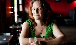 Culinary historian Elizabeth Pearce sips a Sazerac cocktail. - IMAGE VIA