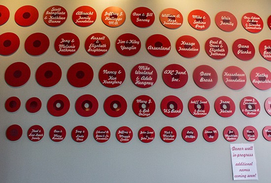 One of the cafe's walls hosts a donor wall in development.