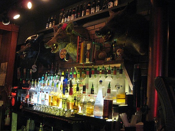 What bar would be complete without taxidermied boars sporting bling? - DIANA BENANTI