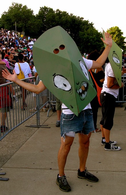 Green meanie masks were handed out by Black Spade and co., jean shorts were not. (See more photos here: "Lupe Fiasco under the Arch, 8/1/09")