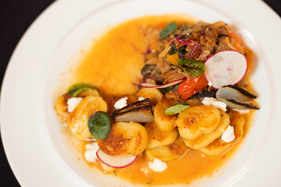 Gnudi, served with the restaurant’s sensational pork shoulder, is a standout dish on a formidable menu.