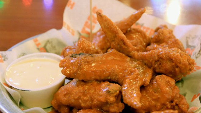 Hooters' original wings are battered, deep-fried and tossed in Buffalo sauce.