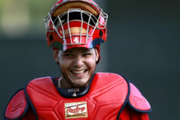 Yadier Molina leaves crackers for his brother, Jose, at the plate