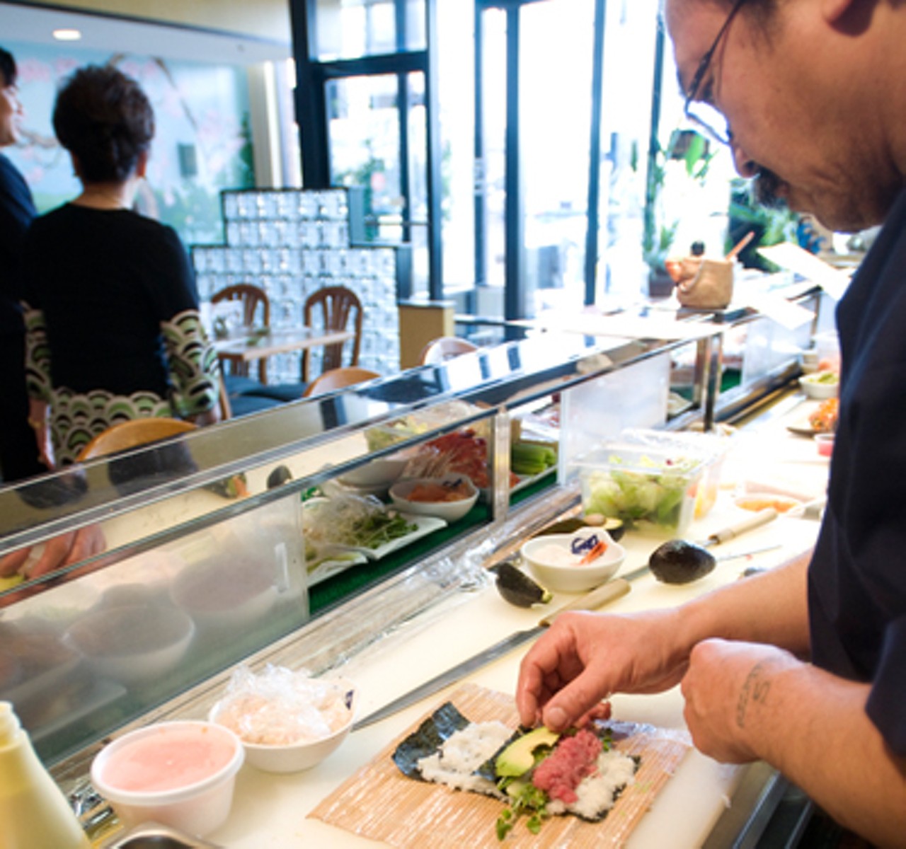 Assistant chef Mr. Aoy making a sushi roll. Read Ian Froeb's Review: "In Chesterfield, Momoyama's picks up where Yoshi's Sushi left off."