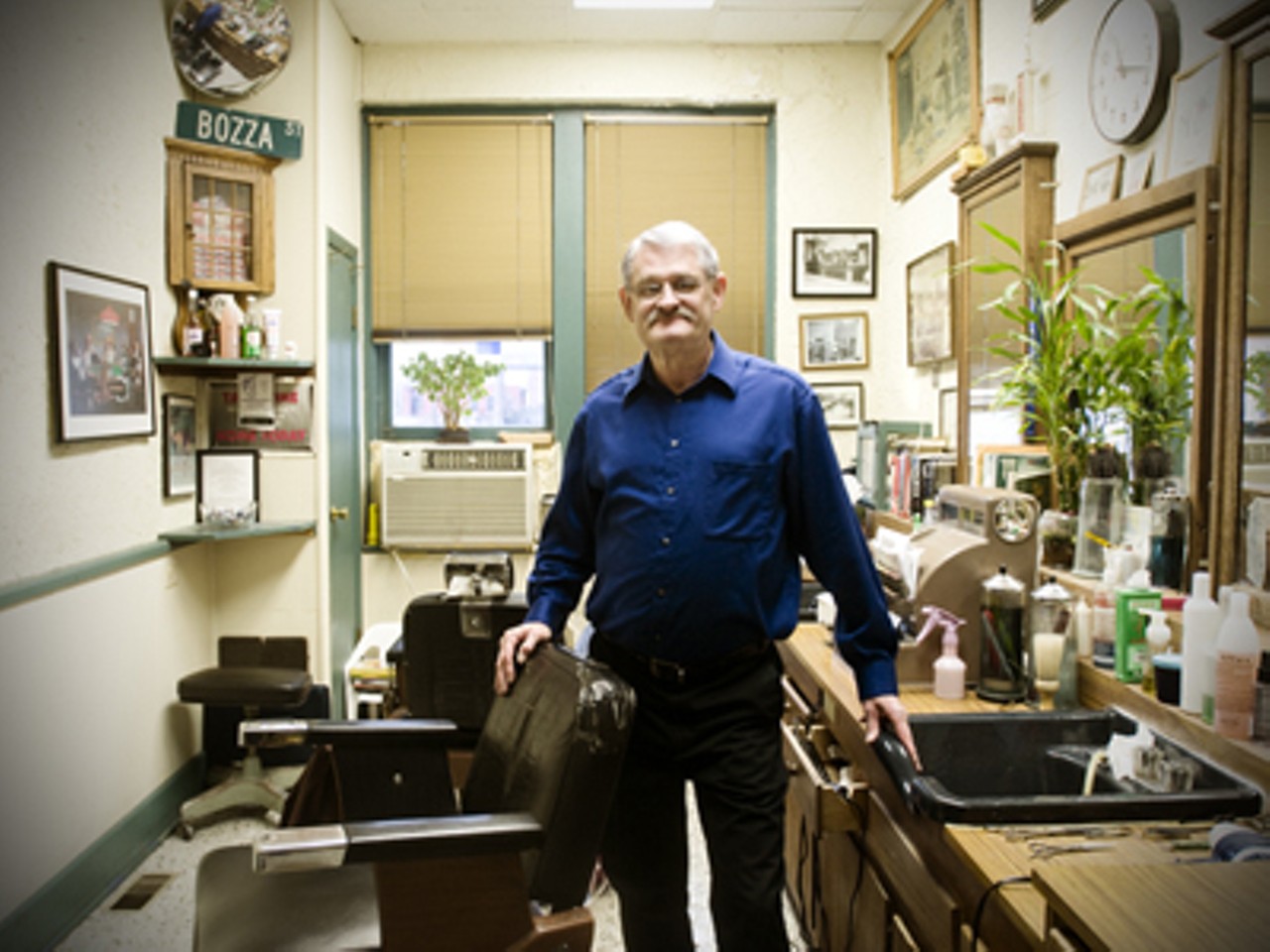 Haunted Alton tour guide and barber, Wayne Hensley, in his shop in the Mineral Springs Mall, Alton, Illinois.