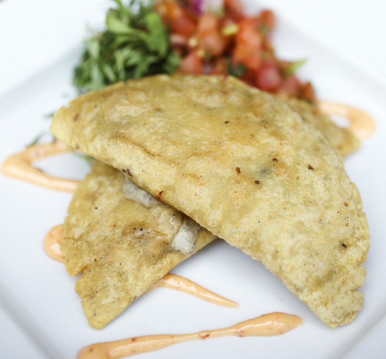 The Quesadillas Tradicionales are corn masa turnovers filled with saut&eacute;ed huitlacoche, &lsquo;Mexican truffles&rsquo;, wild mushrooms and  chihuaha cheese, accompanied by chipotle lime aioli.