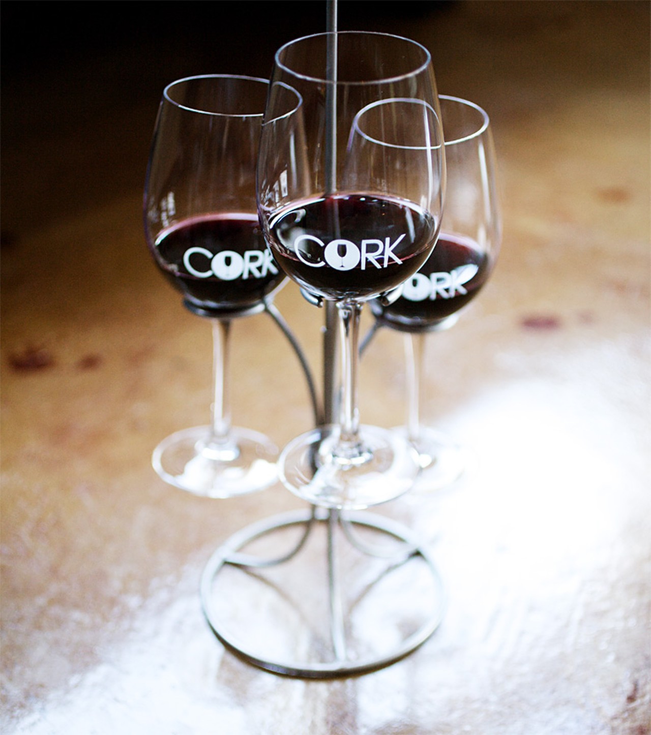 A flight of full-bodied reds offered at Cork Wine Bar. They are 14 Hands Cabernet Sauvignon (a 2007 from Washington), Sterling Vintner's Collection Meritage (a 2007 Central California Coast) and Navarro Malbec (a 2008 from Mendoza, Argentina).
