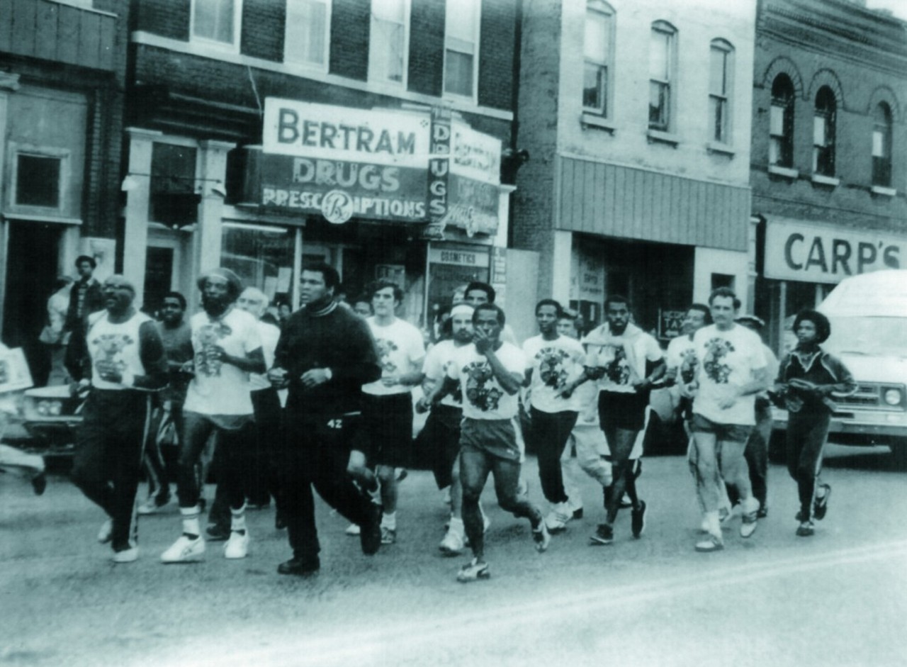 Muhammad Ali, Dick Gregory, Ronald Gregory, and Ivory Crockett, along with several others, are pictured on Manchester Avenue in 1976 running part of the St. Louis leg of the 3,000-mile run from California to New York to dramatize hunger in America. In 2013, the USDA reported that about 49 million Americans, one in six, are in danger of suffering from a lack of proper food.
(Courtesy of Ronald Gregory.)