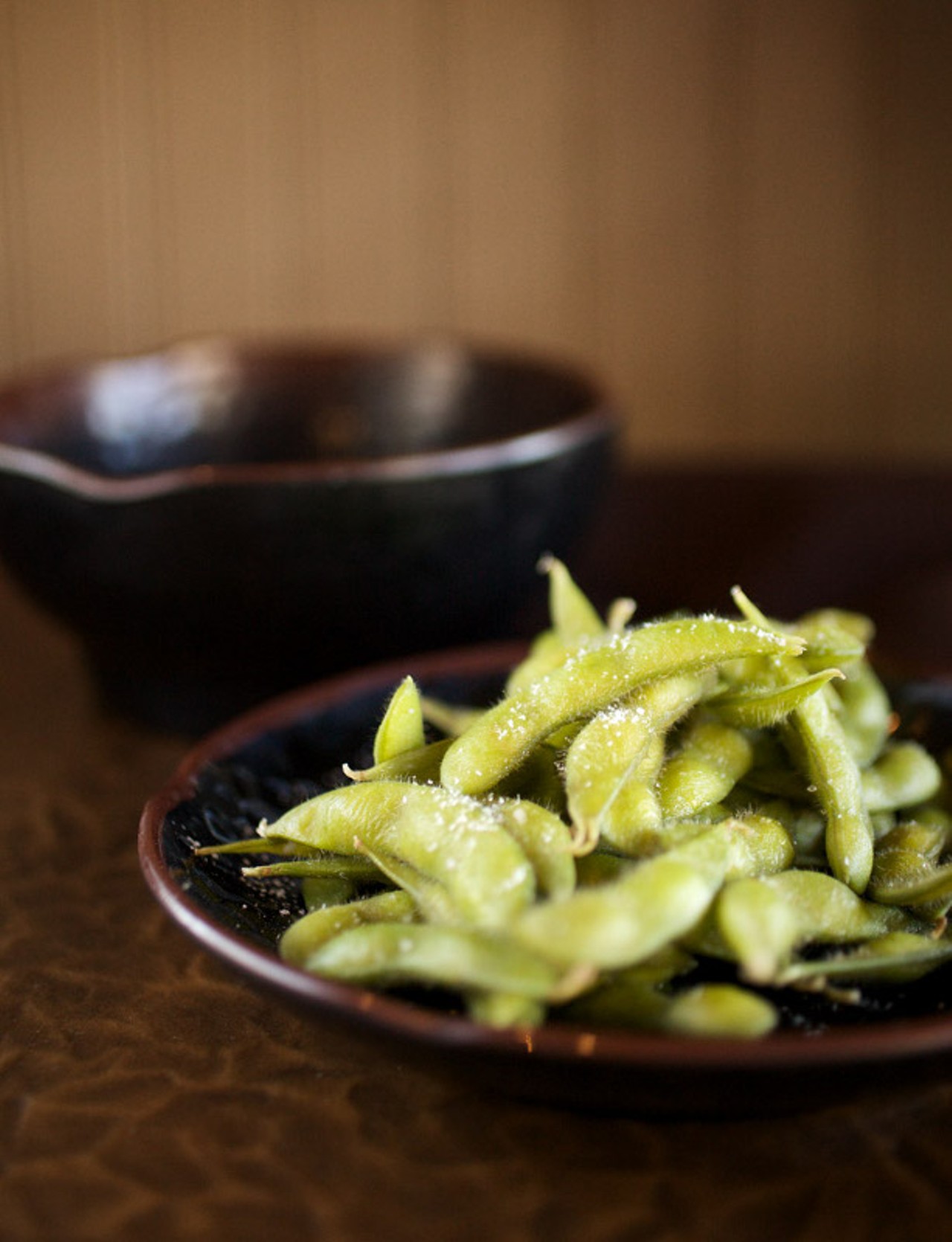 Edamame - boiled, salted soybeans.