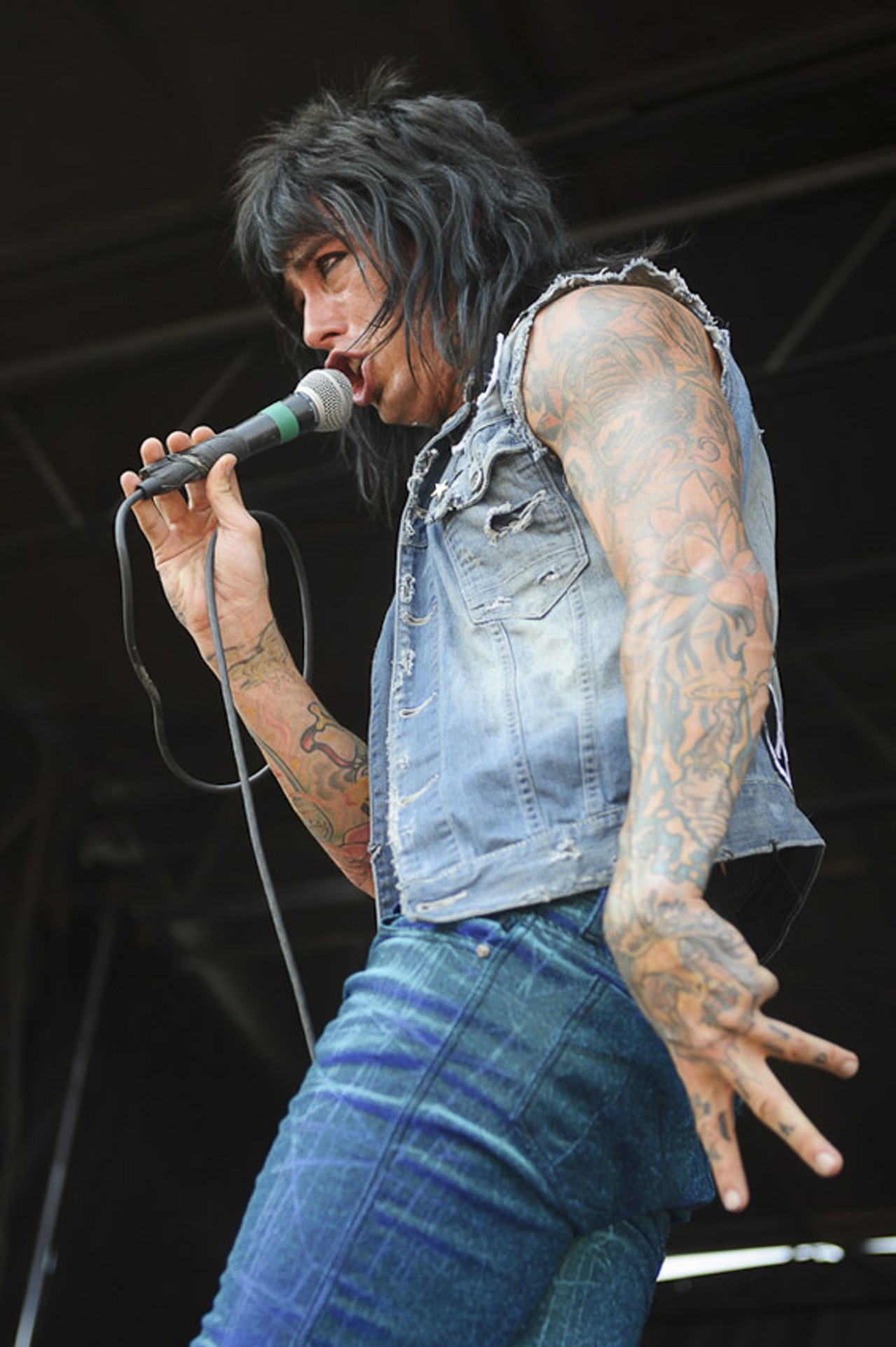 Falling in Reverse performing at Warped Tour at the Verizon Wireless Amphitheater in St. Louis on July 5, 2012.