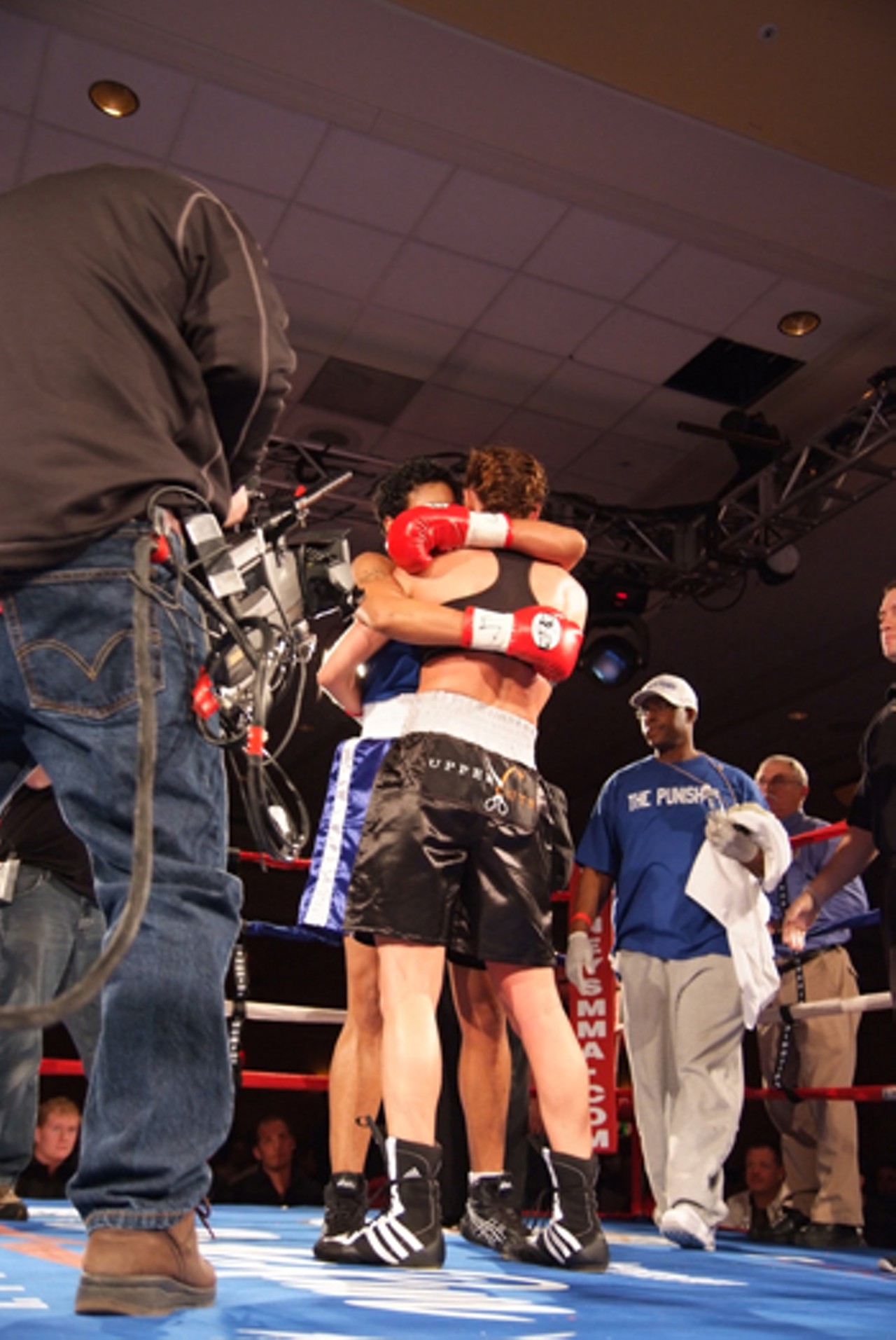 O'Hare and Hamlett hug in the ring after the fight. Neighter fighter went down during the match, which ended in -- a draw.